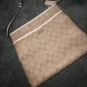 Coach crossbody bag comes with matching wallet